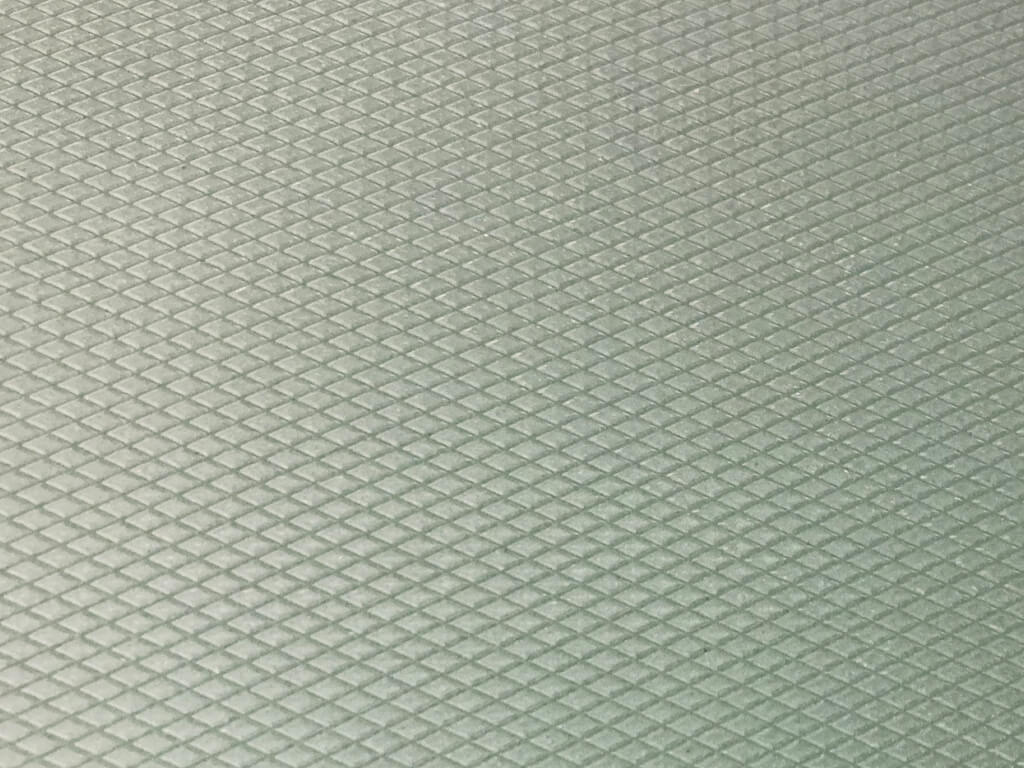 Microscopic Textured Surface with Diamond Embossed Pattern